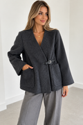 Dark grey wool and cashmere jacket with silver-tone buckle and two front pockets, worn by a model – Darivé Select
