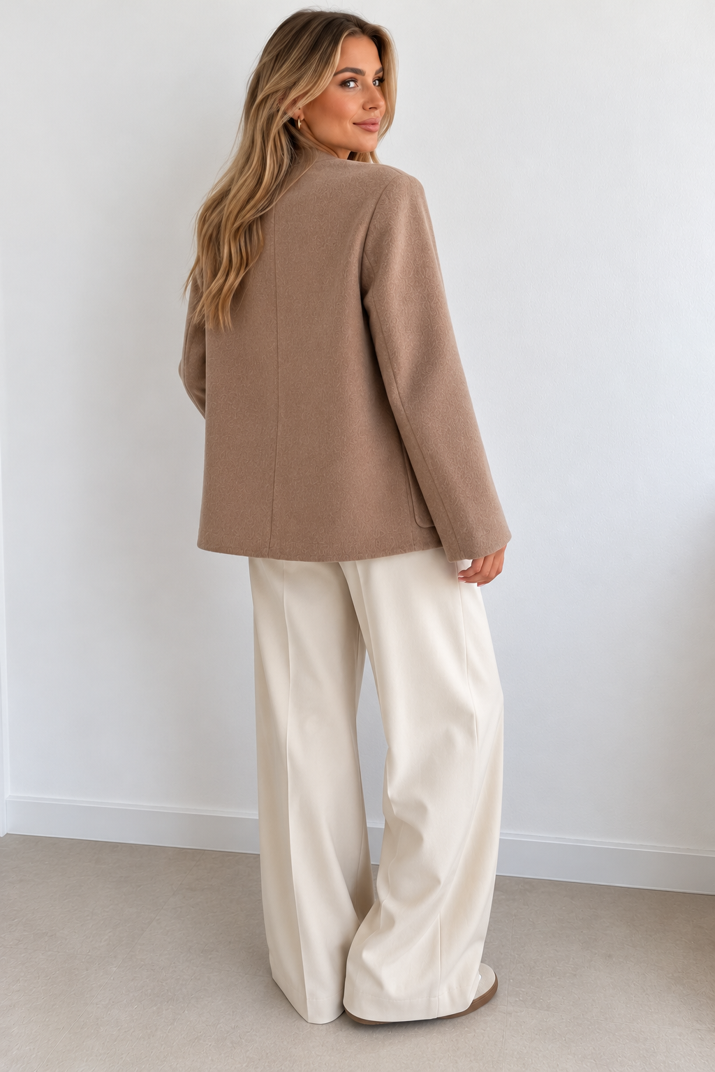Back view of a taupe wool and cashmere jacket showing its slightly oversized cut and centre seam – Darivé Select